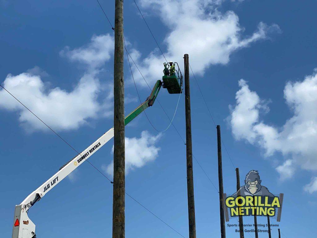 Golf course netting installation